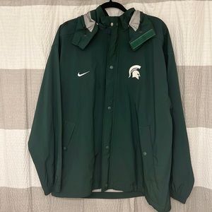 Michigan State team issue Nike rain suit. Green color, jacket sz L, pants sz M.